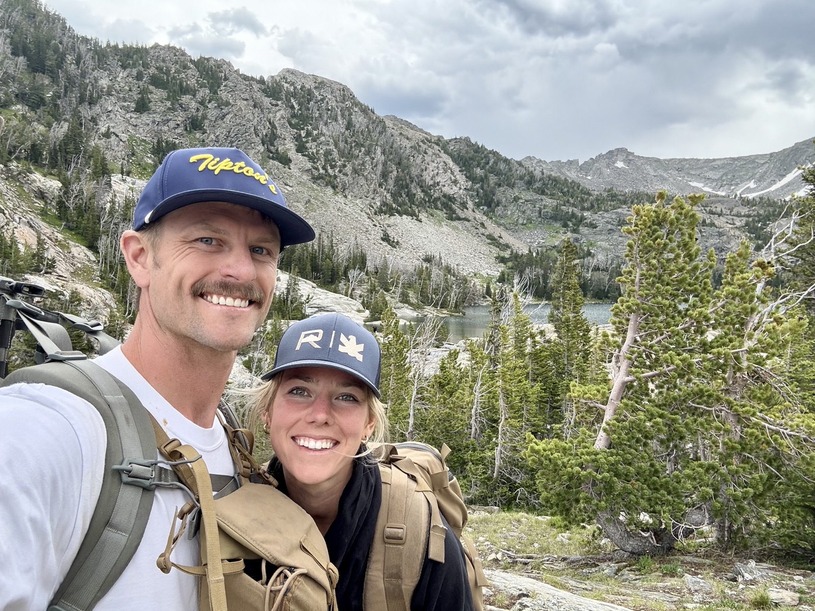 Erik and Kinsey Fritz hiking in the Montana mountains