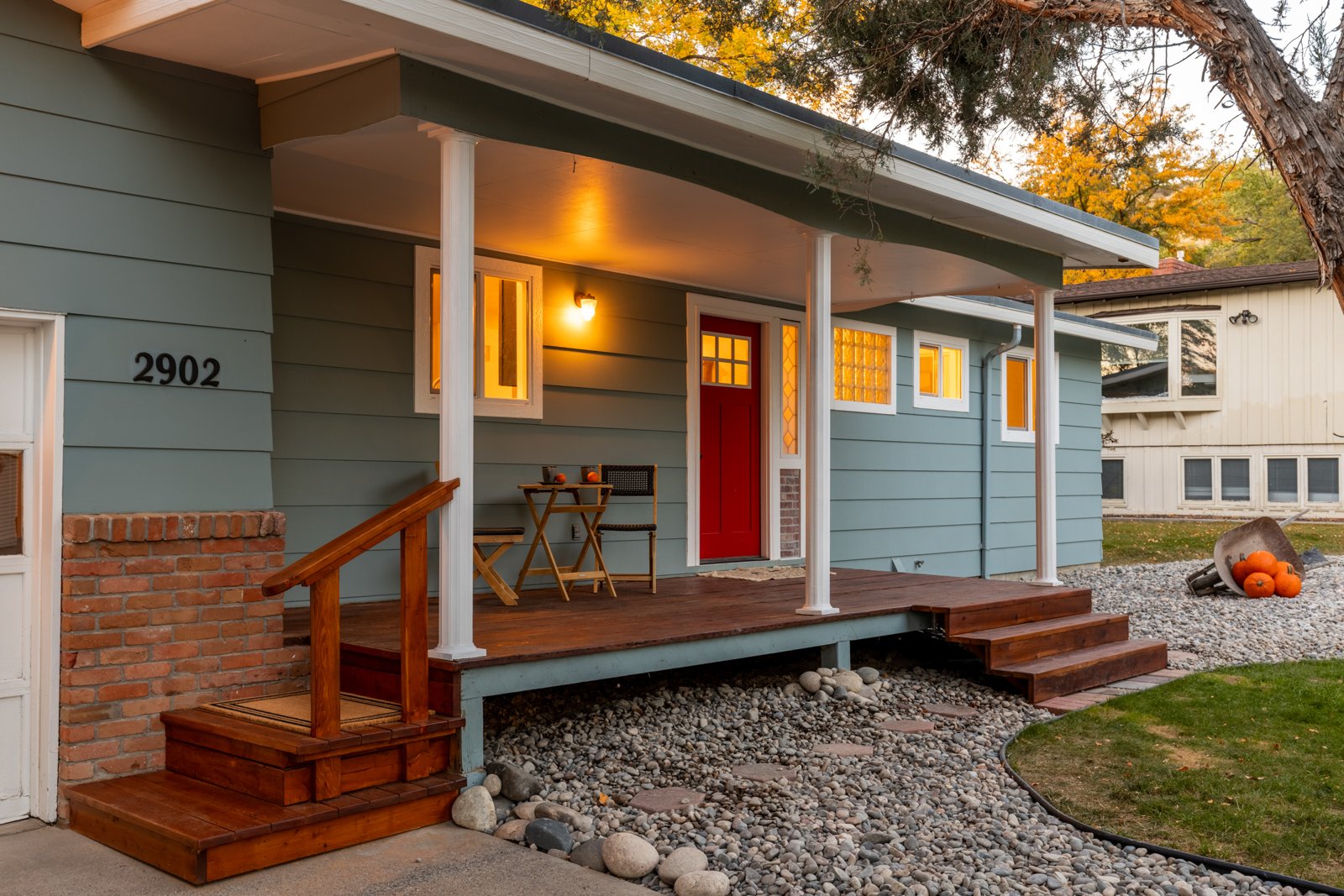 Exterior remodel with new front porch and landscaping