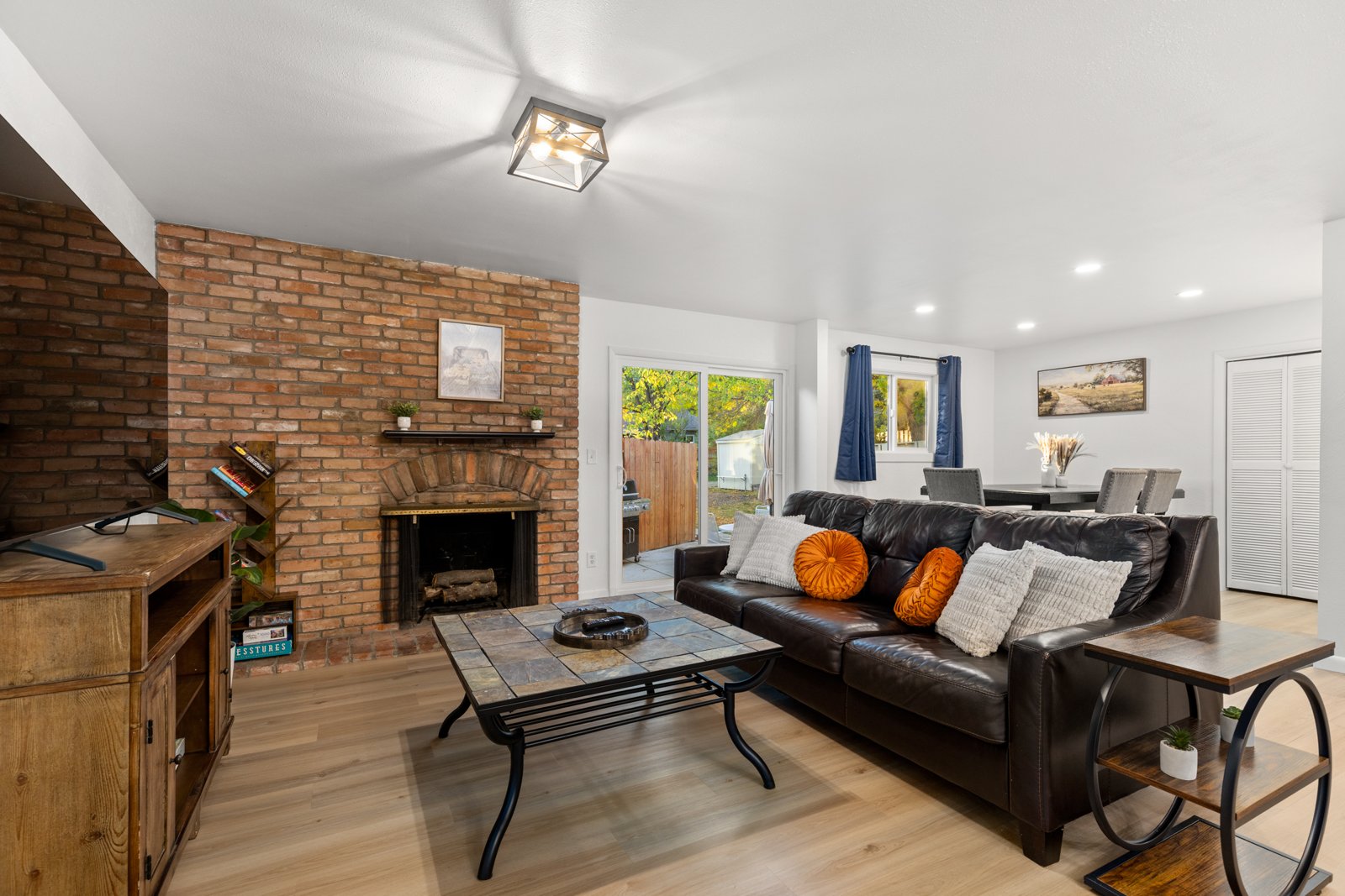 Living room remodel with brick fireplace
