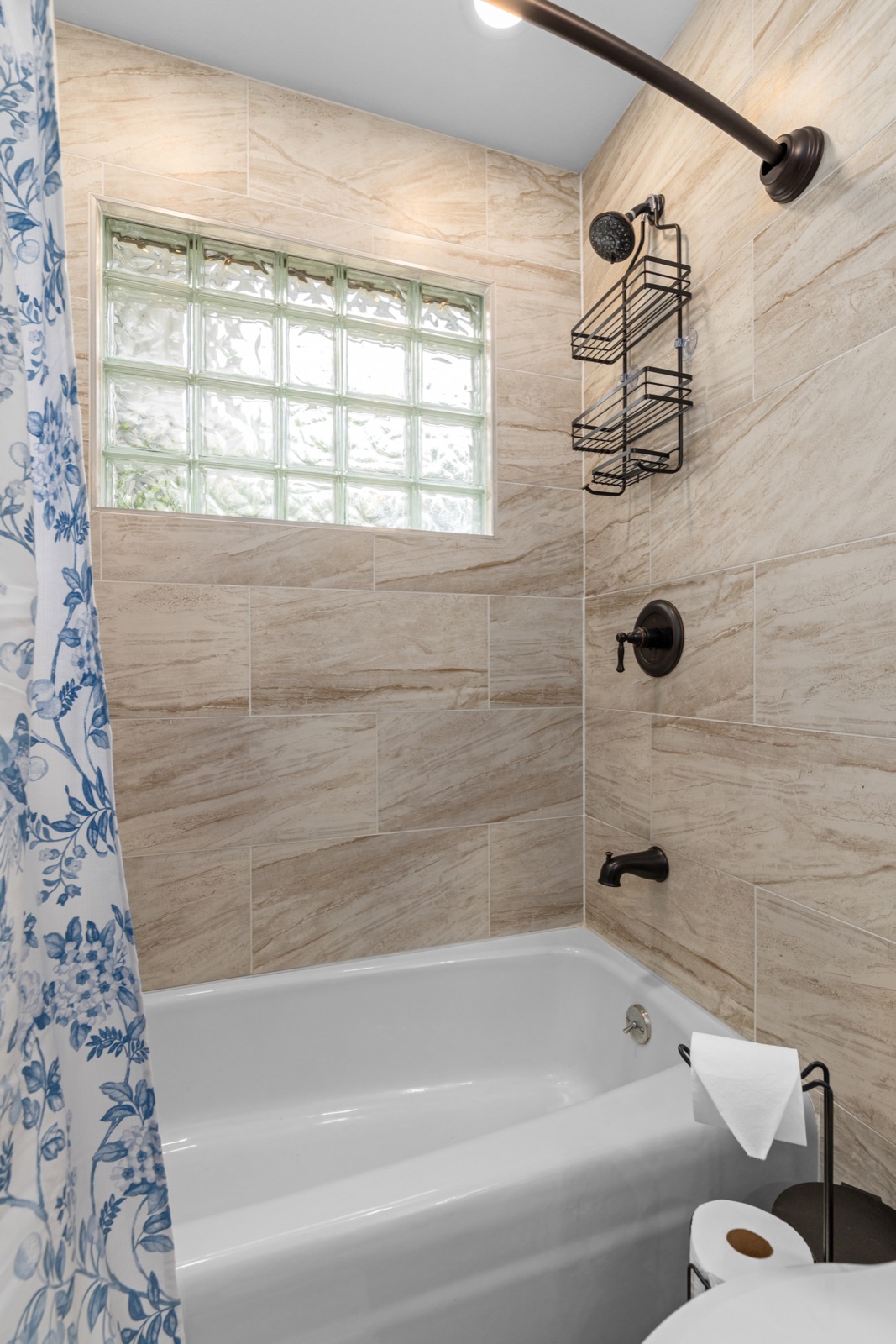 Tiled bathroom tub and shower surround