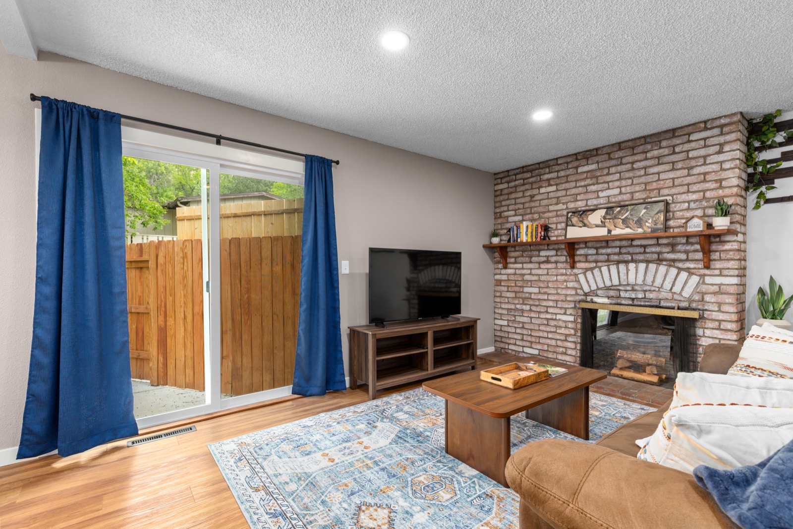Living room remodel with stone fireplace